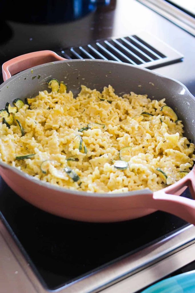 Lemon zucchini pasta in a sauté pan. 