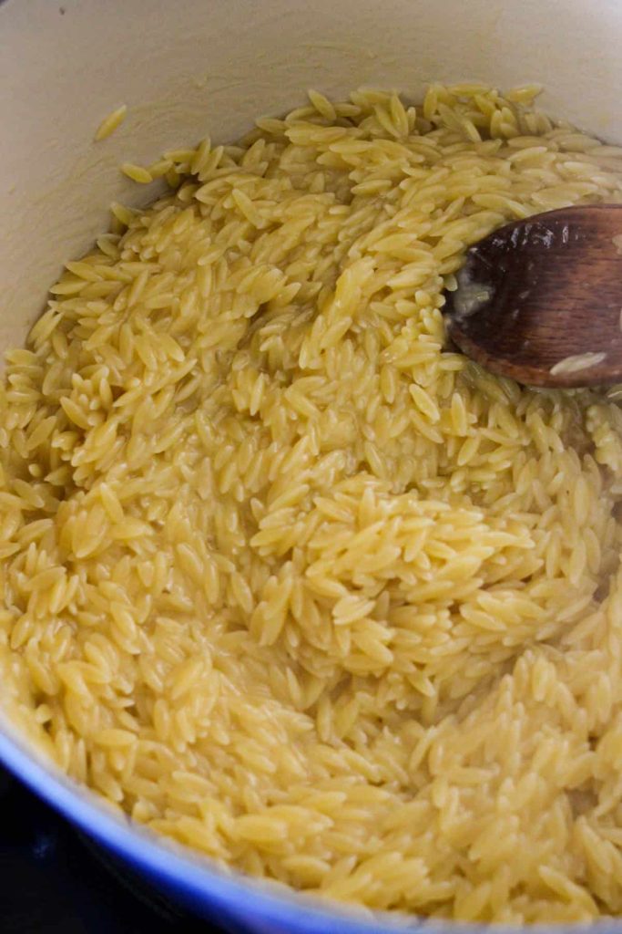 Orzo in a dutch oven after being cooked. 