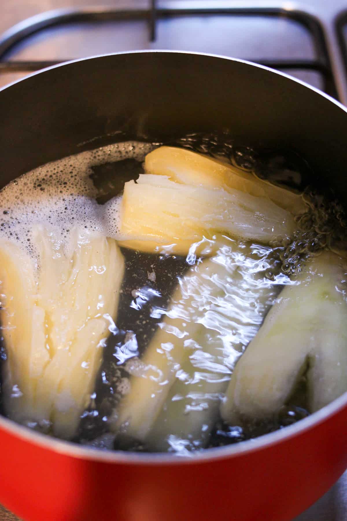 Yuca boiling in a pot of water. 