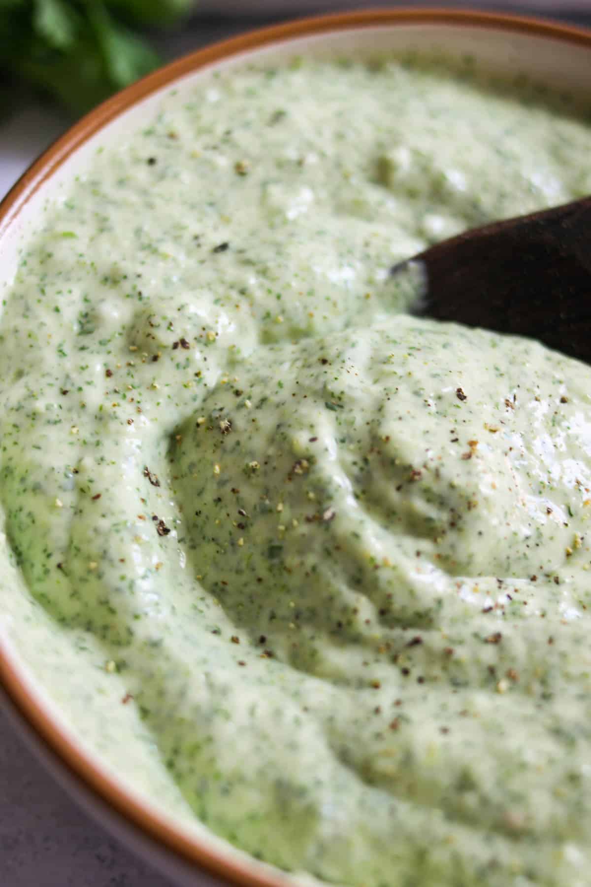 Cilantro jalapeno sauce in a bowl. 