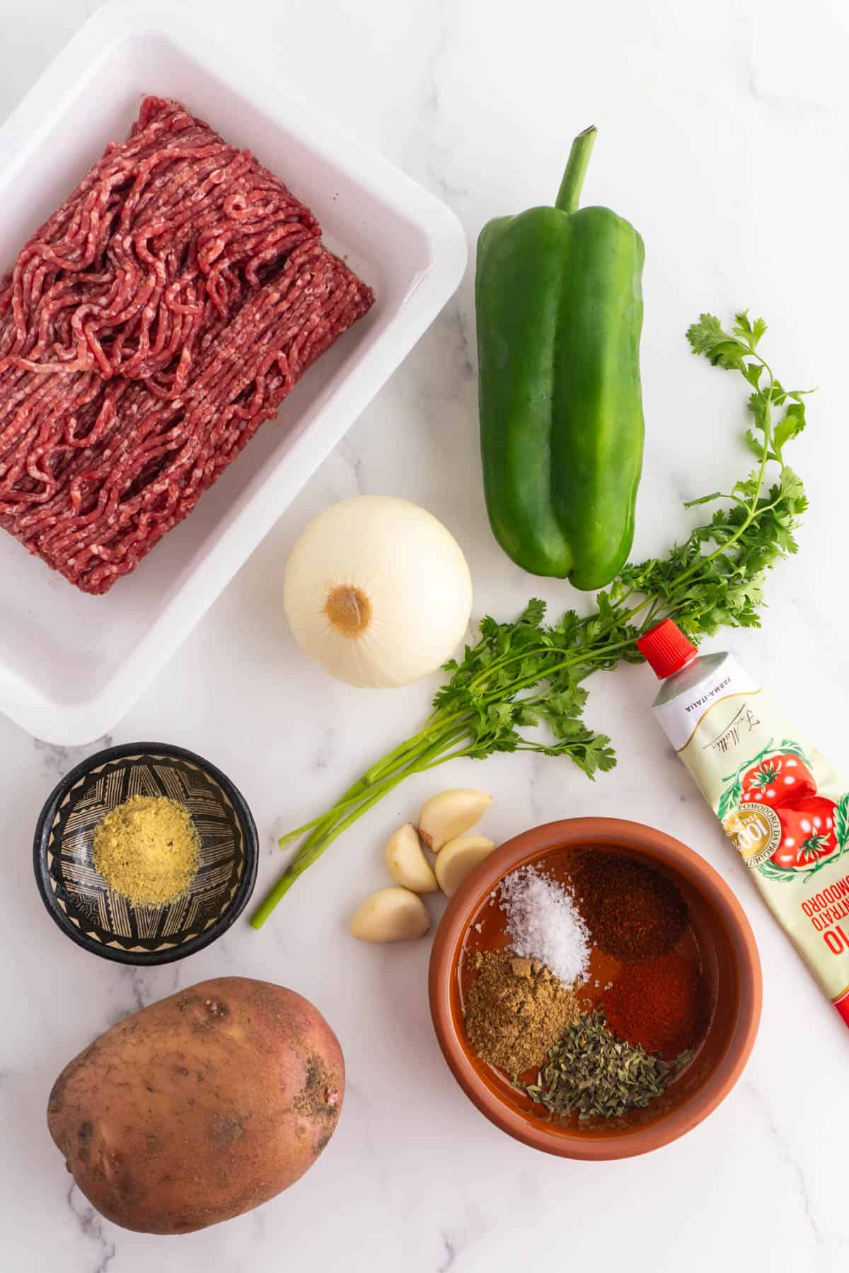 Ingredients needed to make Mexican picadillo recipe.