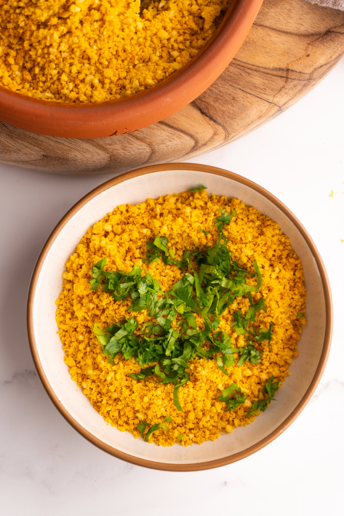 Salprieta in a small bowl with chopped cilantro added.